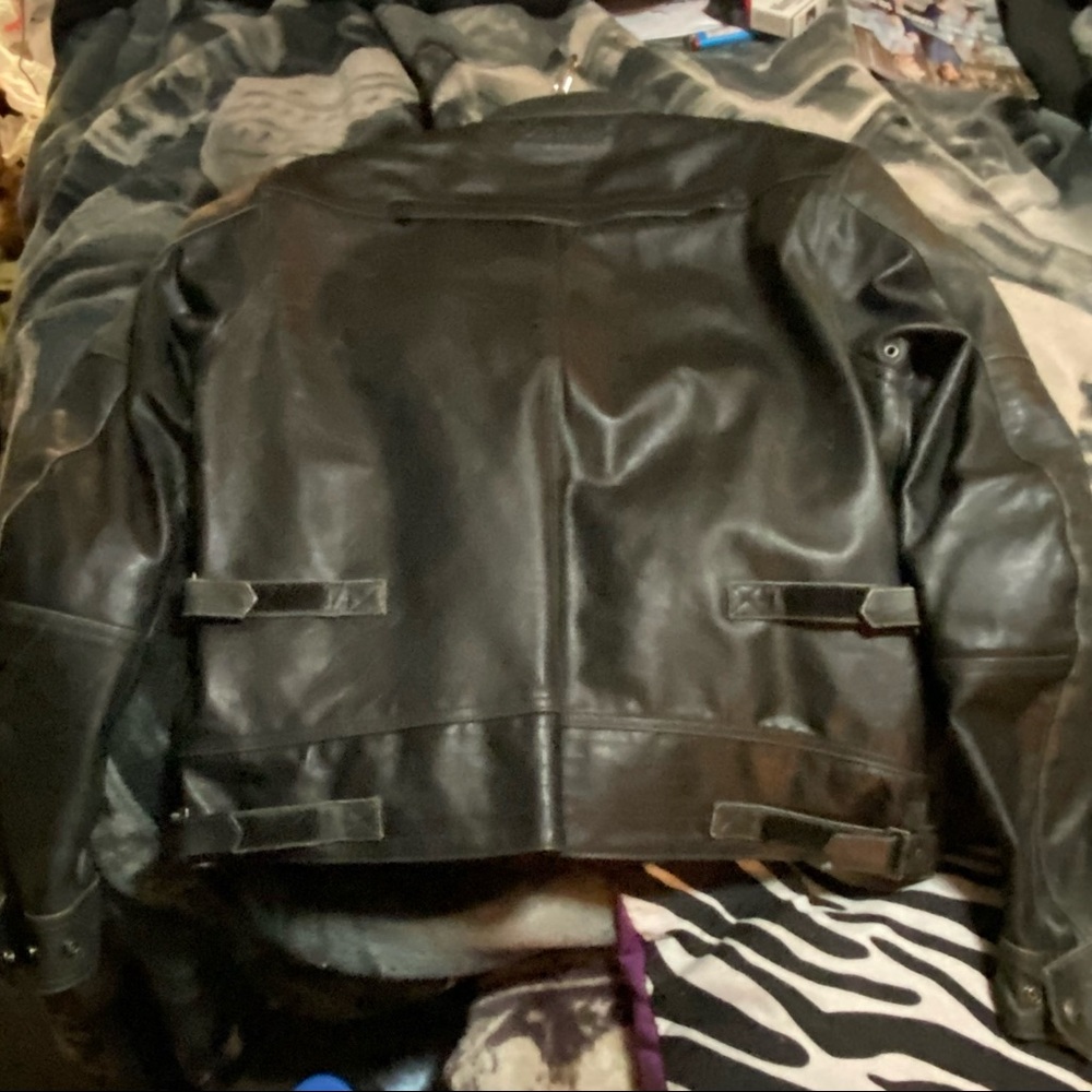 New with tags size large Indian leather jacket. Brown in color.
